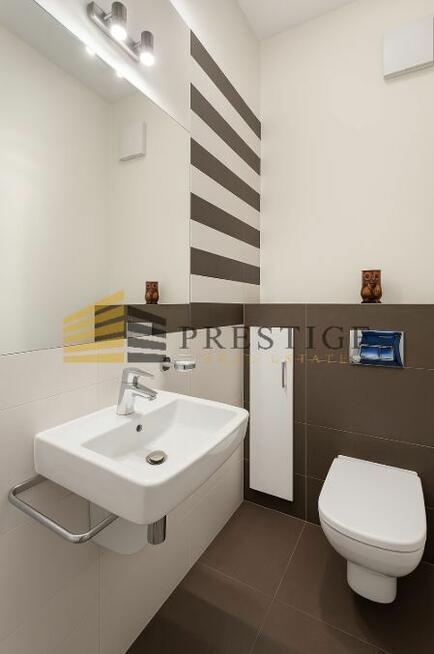 Ekskluzywny Apartament z Prywatnym Patio – Prestiż