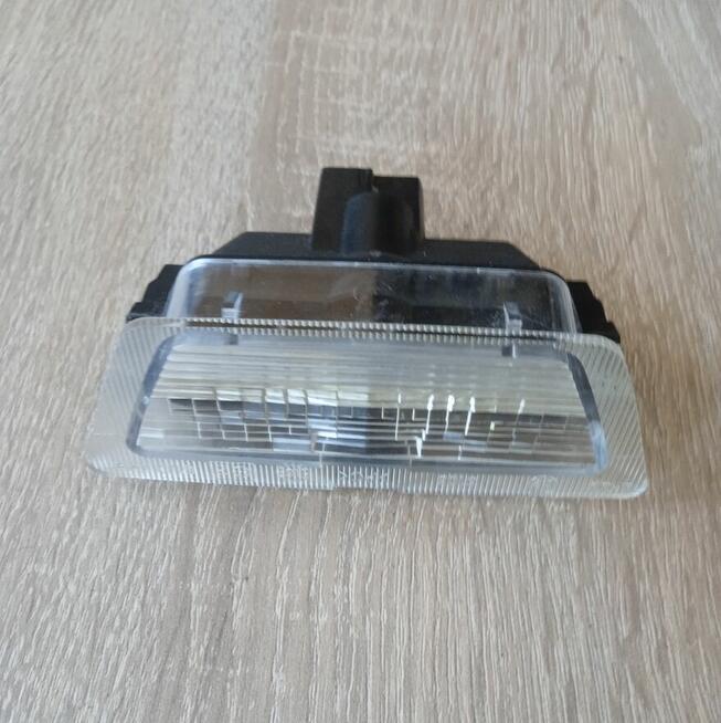 LAMPKA TABLICY REJESTRACYJNEJ OPEL ASTRA G II Lampa