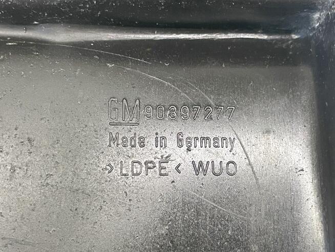 Chlapacz prawy Opel Astra F GM90397277