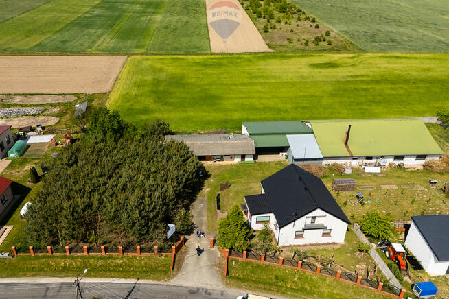 Teren 2,18 ha z domem i budynkami gospodarczymi