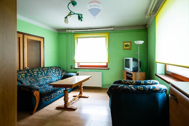 Teren 2,18 ha z domem i budynkami gospodarczymi