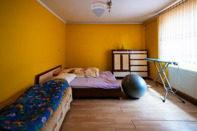 Teren 2,18 ha z domem i budynkami gospodarczymi