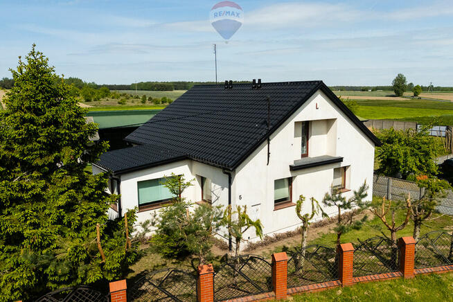 Teren 2,18 ha z domem i budynkami gospodarczymi