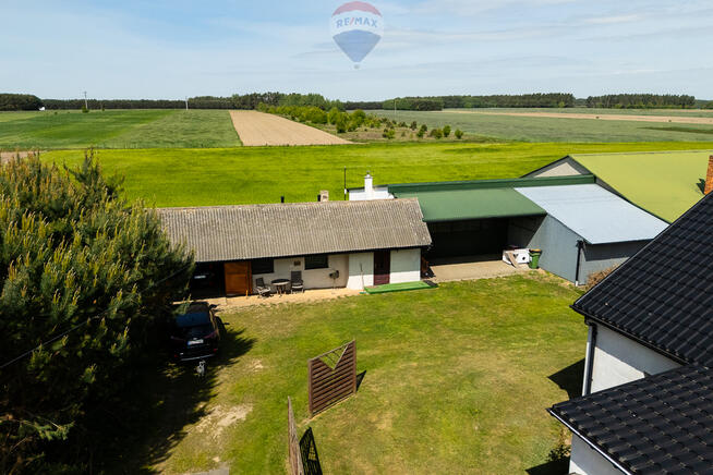 Teren 2,18 ha z domem i budynkami gospodarczymi