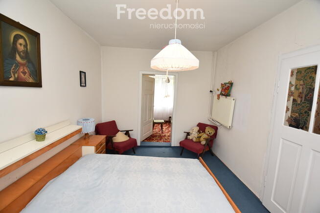 Domek w otoczeniu zieleni, Skomlin