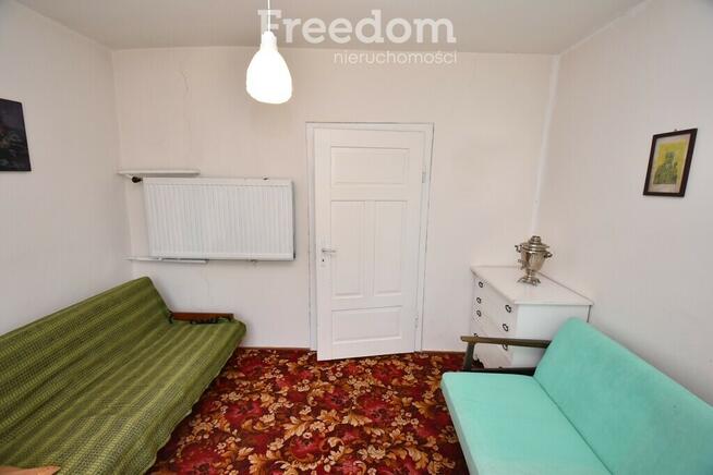 Domek w otoczeniu zieleni, Skomlin