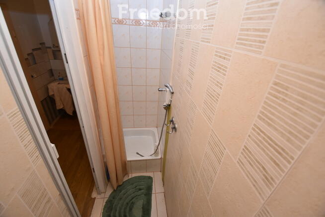 Domek w otoczeniu zieleni, Skomlin