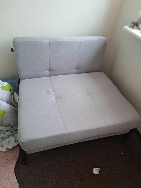 Szafa narożna i fotel jednoosobowy z funkcją spania