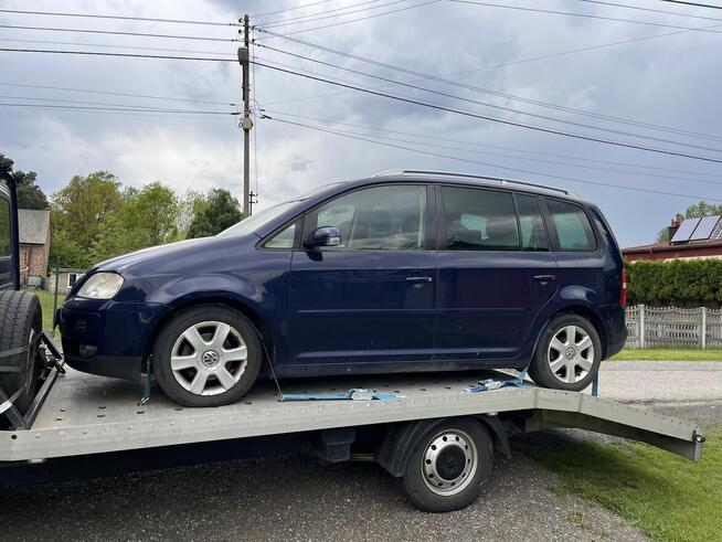 Pomoc drogowa Laweta Autolaweta Transport Pojazdów