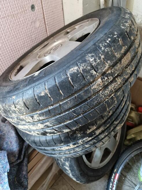 Koła komplet kół 195/65 R15 91V znaczki Volkswagen