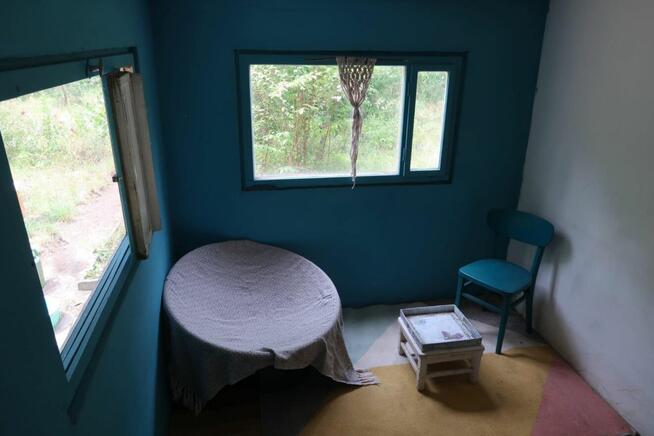 Dwie działki ROD przy lesie.