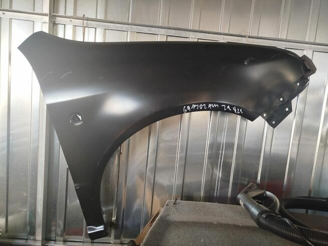 Škoda Fabia błotniki nadwozia prawy i lewy