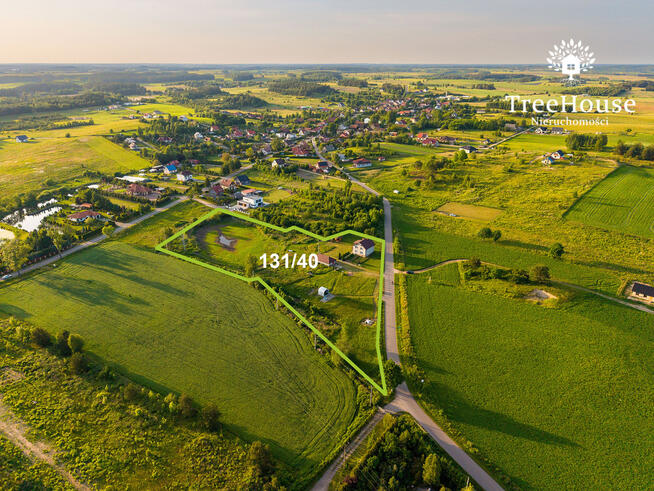 Rodzinny, ciepły dom z oczkiem wodnym na Mazurach