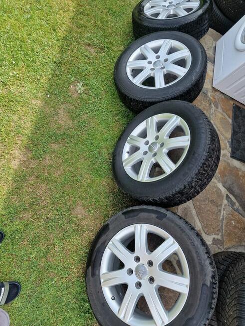 Felgi aluminiowe AUDI 18 z oponami zimowymi FORTUNA 235/60R