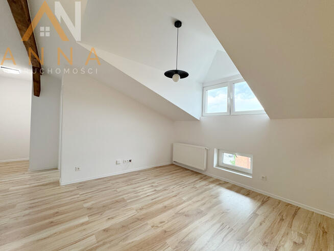 Urokliwe mieszkanie na poddaszu w kamienicy