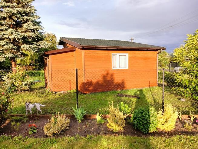 Sprzedam działkę (wyd. WZ) z domkiem rekr. całor., dojazd A2