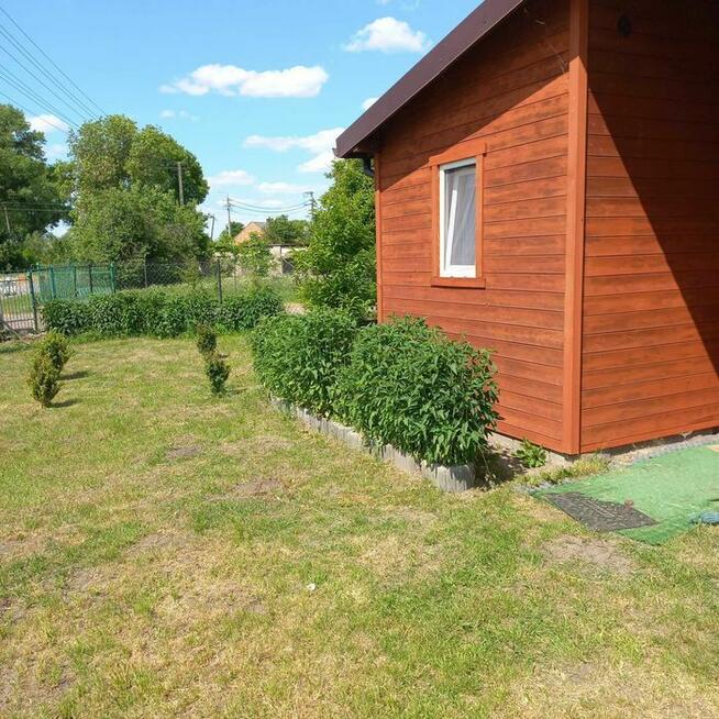 Sprzedam działkę (wyd. WZ) z domkiem rekr. całor., dojazd A2