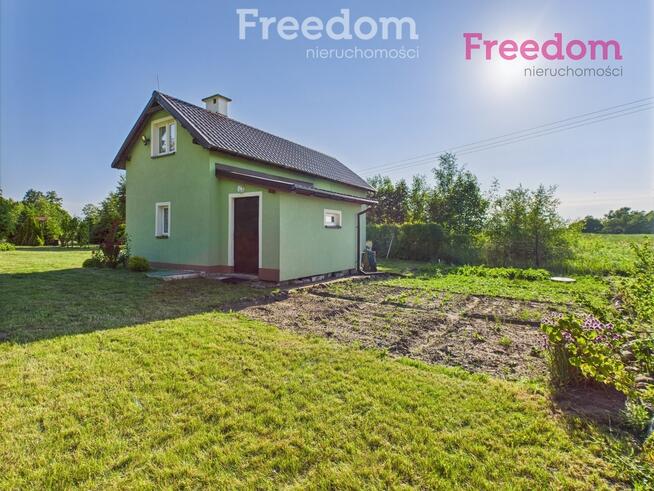 Urokliwy domek całoroczny z dużą działką.