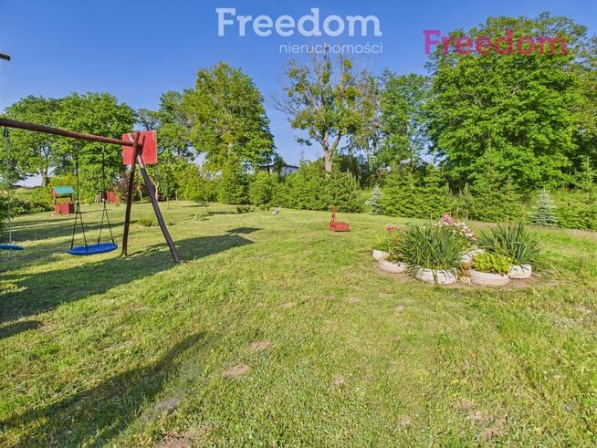 Urokliwy domek całoroczny z dużą działką.