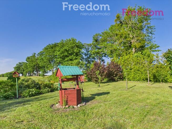 Urokliwy domek całoroczny z dużą działką.