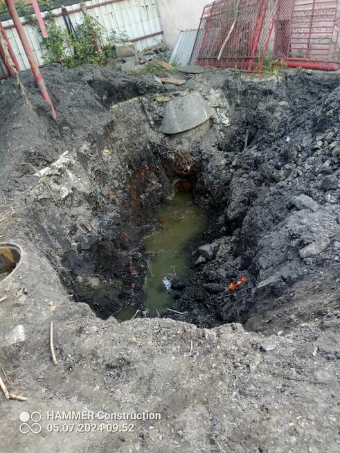 usługi koparko-ładowarką cat.