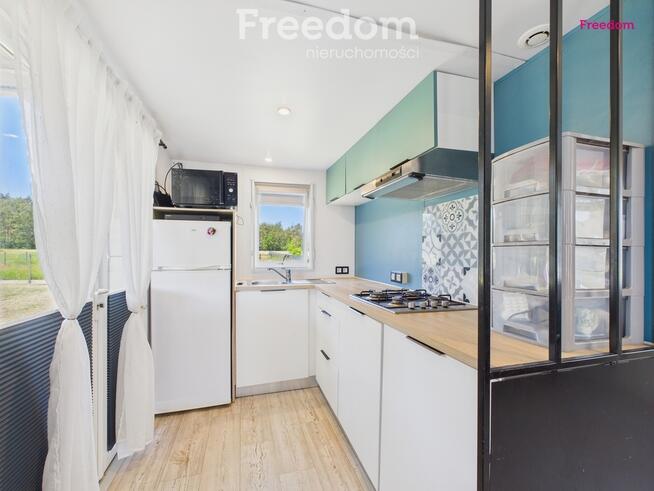 Domek holenderski z tarasem na działce 1055m2.