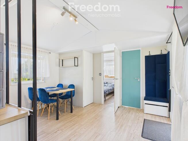 Domek holenderski z tarasem na działce 1055m2.