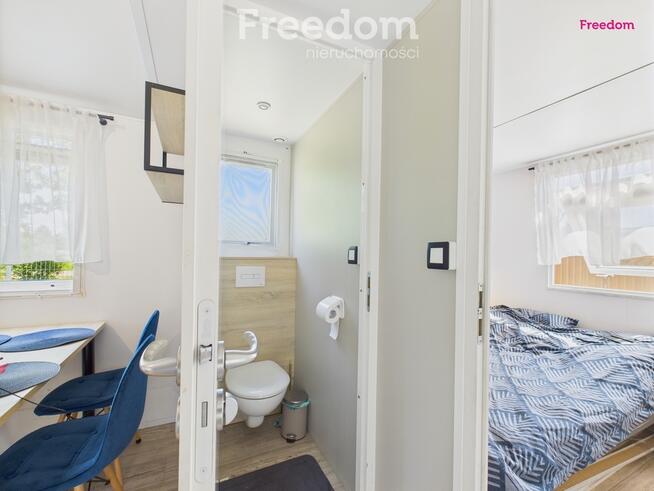 Domek holenderski z tarasem na działce 1055m2.