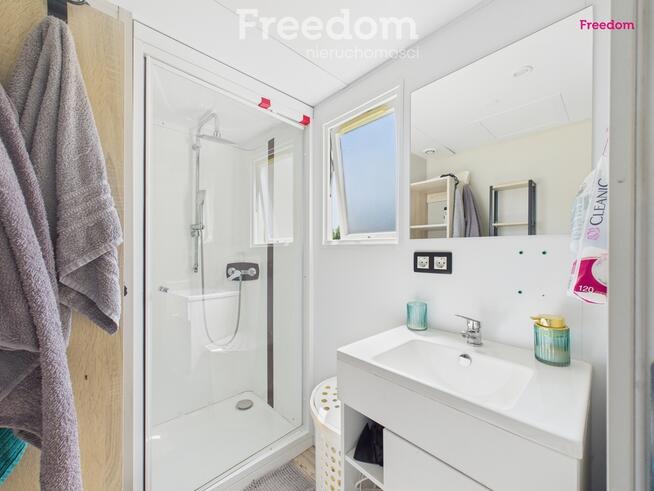 Domek holenderski z tarasem na działce 1055m2.