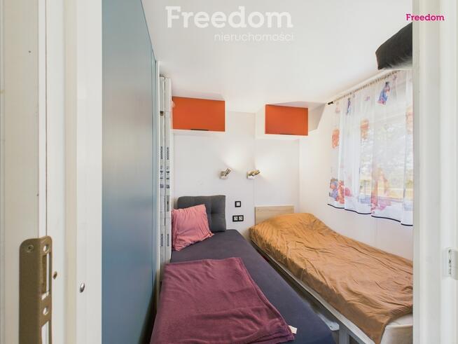 Domek holenderski z tarasem na działce 1055m2.