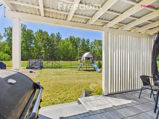 Domek holenderski z tarasem na działce 1055m2.