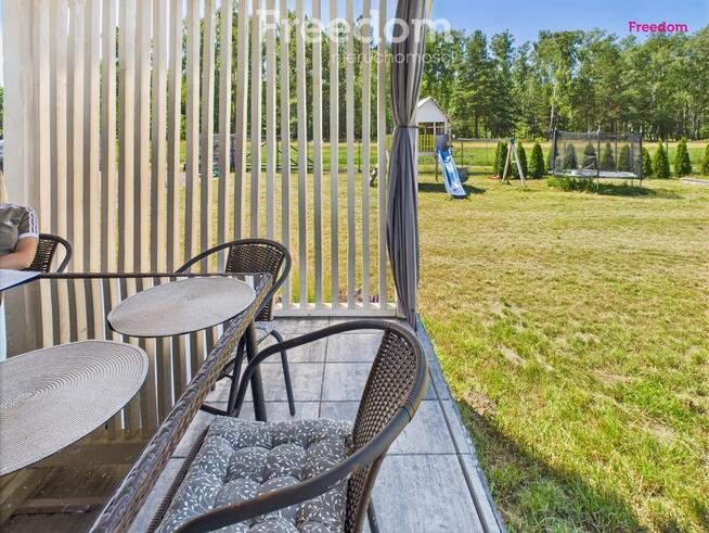 Domek holenderski z tarasem na działce 1055m2.