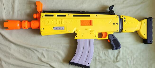 Nerf Fortnite automatyczna wyrzutnia strzałek
