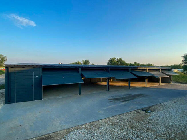 Garaże blaszane wiaty śmietnikowe i domki narzędziowe