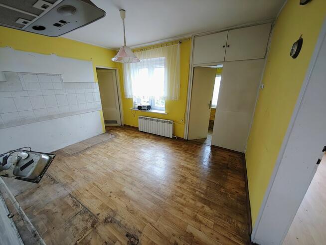 Sprzedam połowę domu z działką i garażem