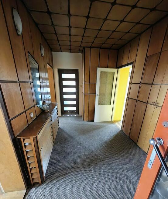 Sprzedam połowę domu z działką i garażem