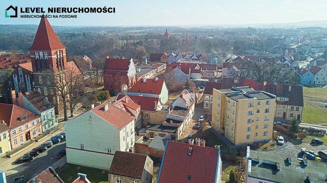 Mieszkanie plus działki w Pasłęku