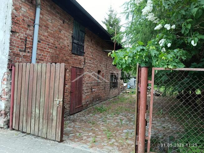 Frombork działka z budynkiem dospodarczym.