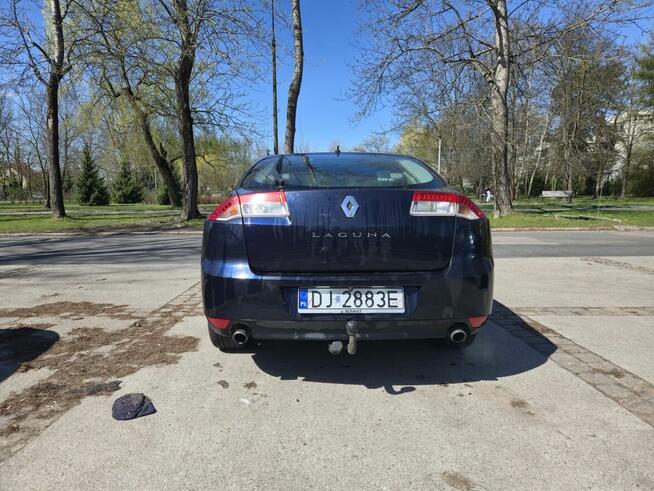 Syndyk sprzeda samochód Renault Laguna III