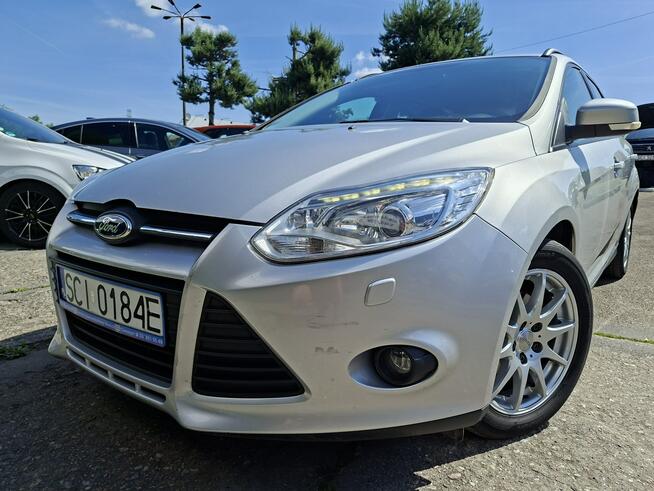 Ford Focus Klimatyzacja, Podgrzewana szyba czołowa, 2 kpl. kół, Bi-Xenon