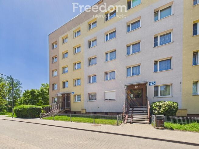 2 pokoje z dużym balkonem na parterz - UE Zawodzie