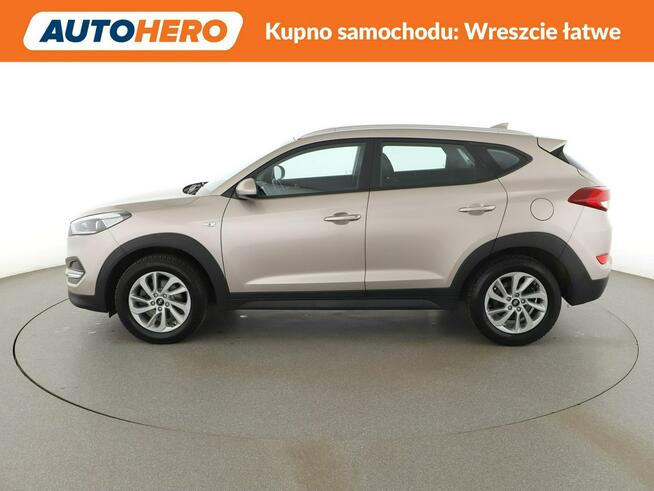 Hyundai Tucson navi klima auto grzane fotele kamera i czujniki parkowania hak