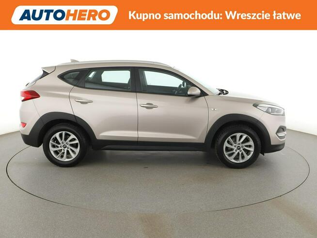 Hyundai Tucson navi klima auto grzane fotele kamera i czujniki parkowania hak