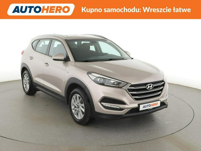 Hyundai Tucson navi klima auto grzane fotele kamera i czujniki parkowania hak
