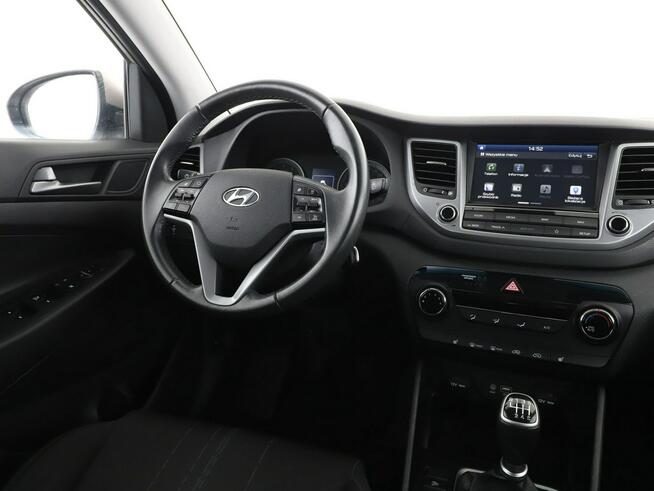 Hyundai Tucson navi klima auto grzane fotele kamera i czujniki parkowania hak