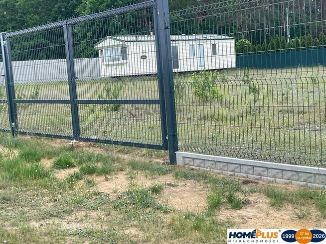 Działka budowlana 1200 m² z domkiem mobilnym.
