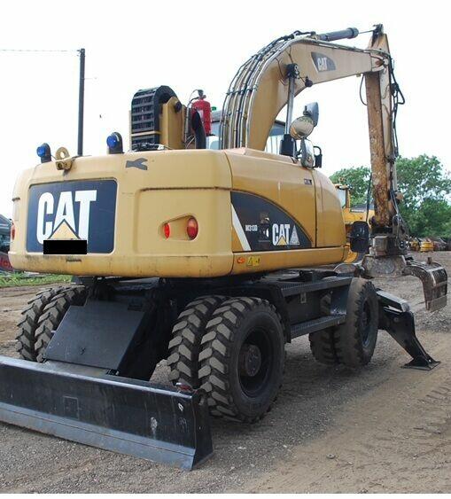 KOPARKA PRZEŁADUNKOWA CAT M313D