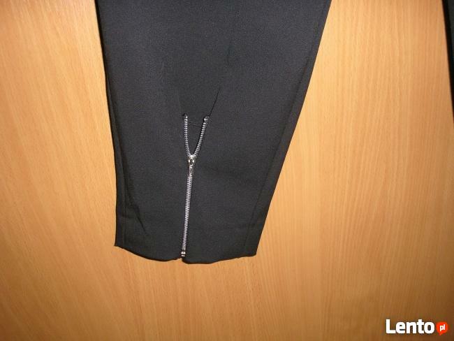 Wysoki stan spodnie z zamkami 40 nowe, bluzka 40-42 BSL