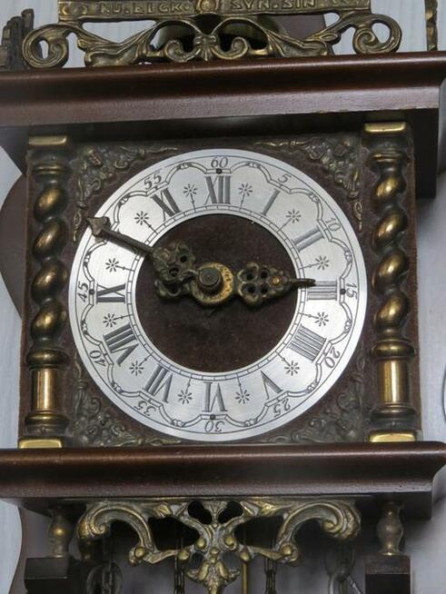 Zegar holenderski z atlasem