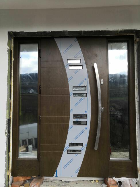 Drewniane drzwi zewnętrzne dębowe od PRODUCENTA możliwy montaż